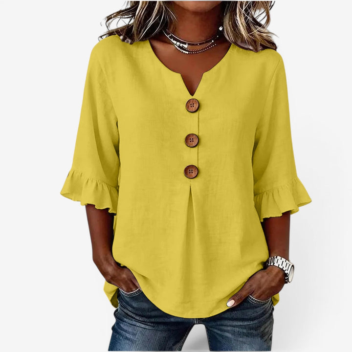 Amy™ Top scampanato con scollo a V